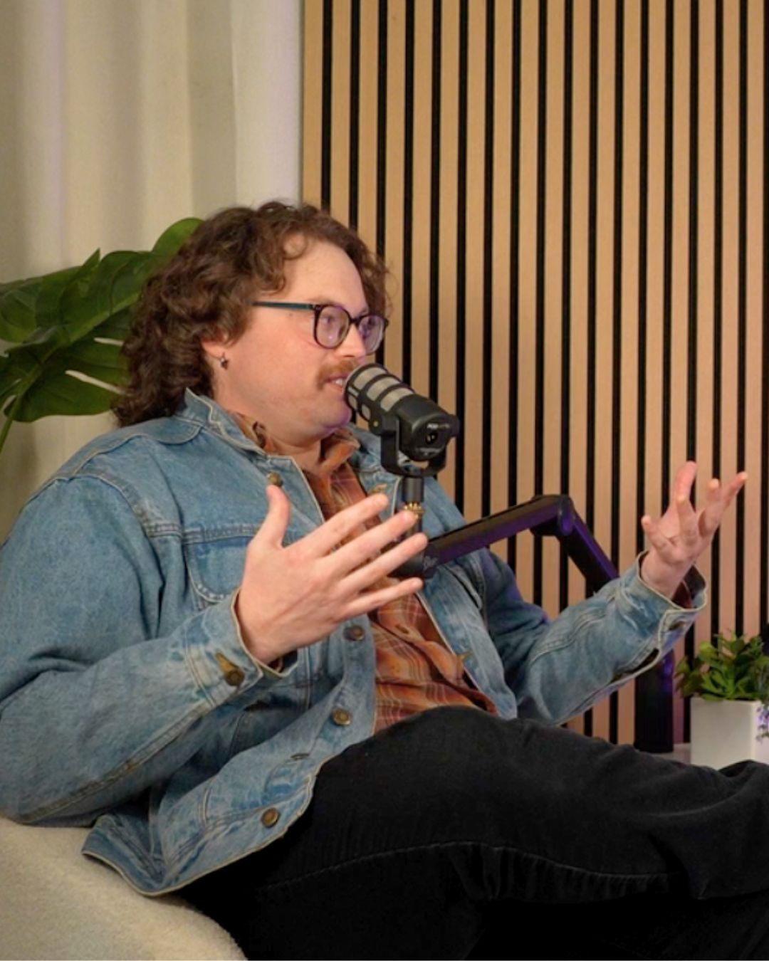 Ray speaking to James in the St. Paul Podcast studio.